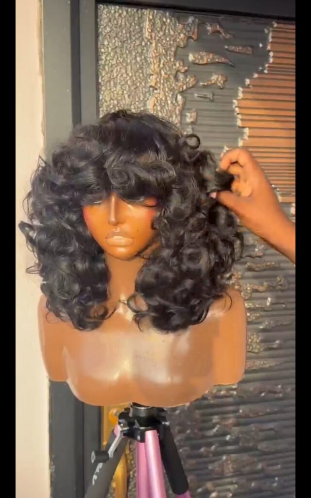 Omotola fringe unit in black color plus free gift
